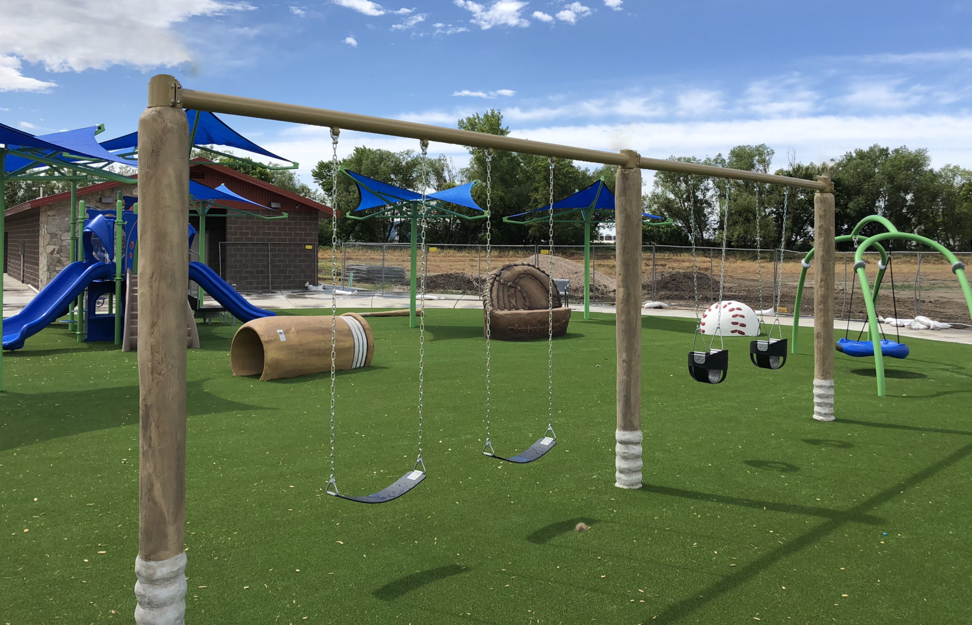 Themed playground swings