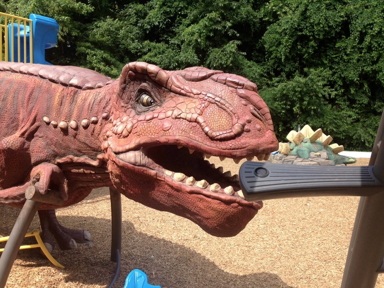 Dinosaur playground equipment